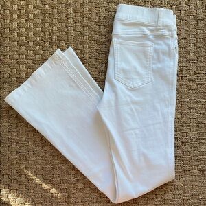 SPANXshape EveryWear Flare Jeans 
Women's flare white jeans size medium.